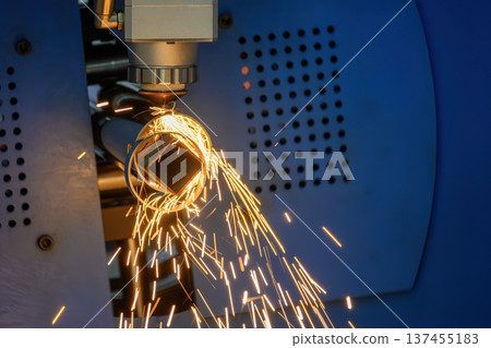 High-precision fiber laser cutting of a stainless steel pipe using advanced CNC technology and assist gas. 137455183