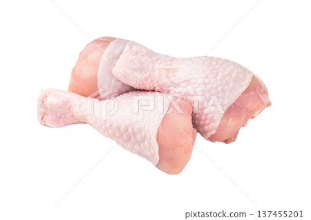 Raw chicken legs drumsticks, perfect for roasting or frying, offering a delicious and juicy flavor in every bite. isolated on white background. top view 137455201