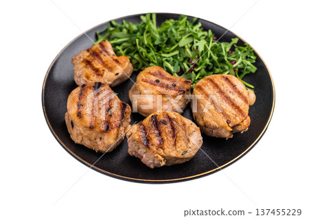 Savory charred pork loin medallion, tenderloin meat showcasing its tender texture and rich flavors after grilling. isolated on white background. top view Savory charred pork loin medallion, tenderloin meat showcasing its tender texture and rich flavors after grilling. isolated on white background. top view 137455229