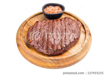 Perfectly grilled top sirloin steak, seared to a juicy finish and garnished with fresh herbs for an irresistible flavor. isolated on white background. top view Perfectly grilled top sirloin steak, seared to a juicy finish and garnished with fresh herbs for an irresistible flavor. isolated on white background. top view 137455235