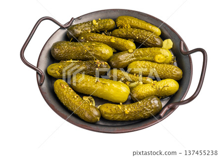 Freshly jarred dill pickles, a delightful addition to any meal or charcuterie board that adds a zesty crunch. isolated on white background. top view Freshly jarred dill pickles, a delightful addition to any meal or charcuterie board that adds a zesty crunch. isolated on white background. top view 137455238