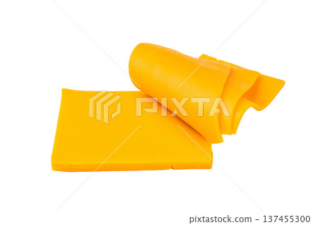 Stack of yellow cheese slices on white backdrop processed dairy ingredient for grilled cheese burgers and snacks 137455300