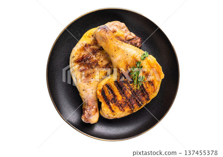 Roasted chicken legs in a plate, grilled eco poultry meat isolated on white background Roasted chicken legs in a plate, grilled eco poultry meat isolated on white background 137455378