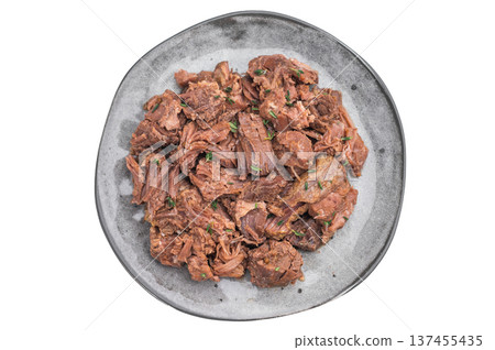 Slow braised moose meat ragout served on a gray plate, tender and savory, highlighting wild venison texture and aromatic herbs. 137455435