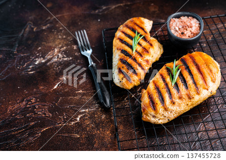 Eco Chicken grilled breasts, roasted poultry farm meat, top view, brown background. 137455728