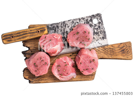 Juicy uncooked pork medallion, raw loin meat a versatile choice for stir fries or savory roasts in any cuisine. isolated on white background. top view Juicy uncooked pork medallion, raw loin meat a versatile choice for stir fries or savory roasts in any cuisine. isolated on white background. top view 137455803