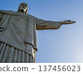 Christ the Redeemer statue standing atop Corcovado Mountain overlooking Rio de Janeiro, Brazil 137456023