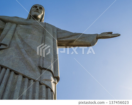 Christ the Redeemer statue standing atop Corcovado Mountain overlooking Rio de Janeiro, Brazil 137456023