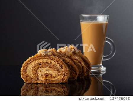 Walnut and buttercream roll: a traditional Oriental pastry. 137456028