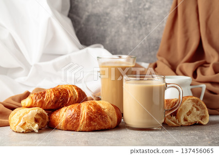Croissants and coffee with cream. 137456065