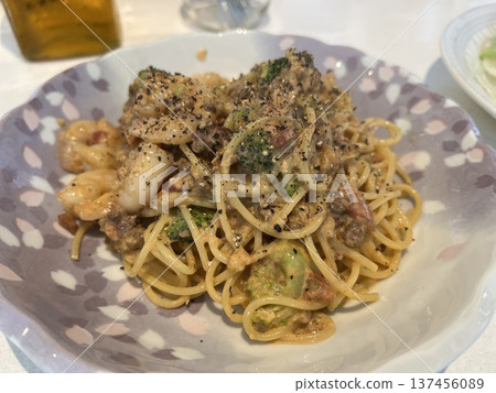 Shrimp and broccoli tomato cream pasta 137456089