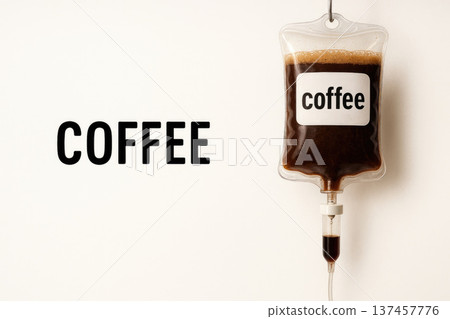 Dropper filled with black coffee on a light background. Space for text. 137457776