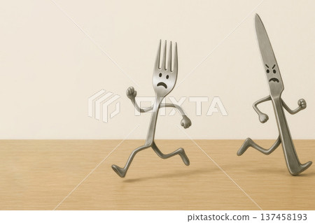The fork runs away from the angry knife. Space for text. The fork runs away from the angry knife. Space for text. 137458193