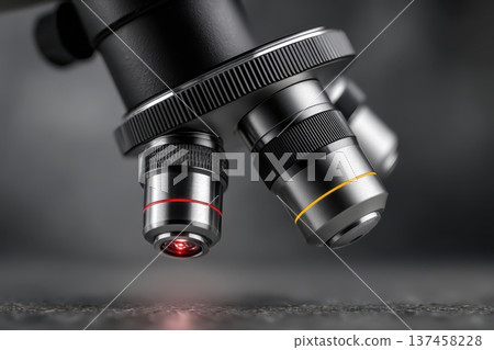 Studying cells using microscope with eyepiece lens 137458228