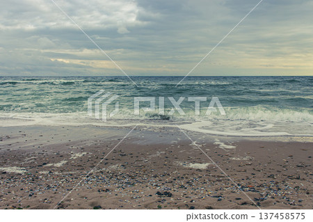 Dramatic winter seascape. Black Sea coast with waves. Seaside on bad weather day. Aerial view of Black Sea. Black sea landscape. Travel in Ukraine. Dramatic seascape background. Dramatic winter seascape. Black Sea coast with waves. Seaside on bad weather day. Aerial view of Black Sea. Black sea landscape. Travel in Ukraine. Dramatic seascape background. 137458575