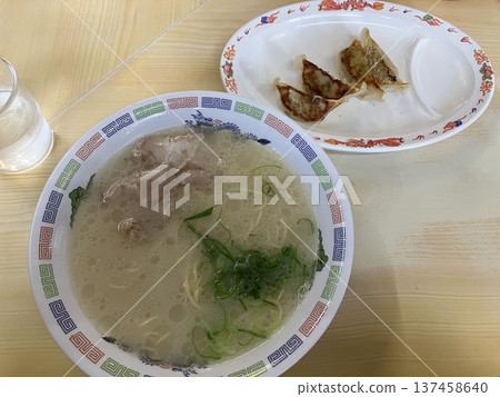 A classic Japanese lunch: soy sauce pork bone ramen and pan-fried gyoza set A classic Japanese lunch: soy sauce pork bone ramen and pan-fried gyoza set 137458640