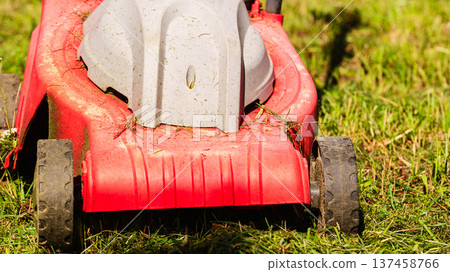 Gardening. Mowing lawn with lawnmower Gardening. Mowing lawn with lawnmower 137458766
