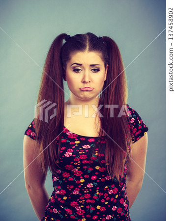 Young teenage woman being offended got the hump Young teenage woman being offended got the hump 137458902