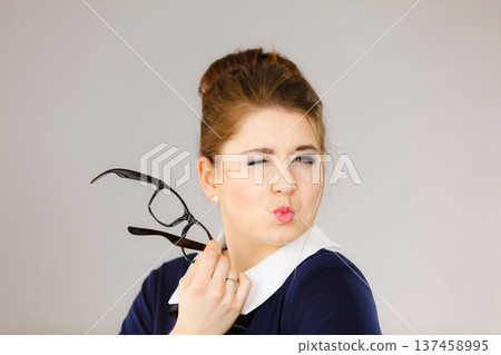 Coquet business woman flirting at work Coquet business woman flirting at work 137458995