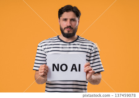 Mature Man Holds Sign No Ai With Serious Face In Studio Visual Protest Against 137459078
