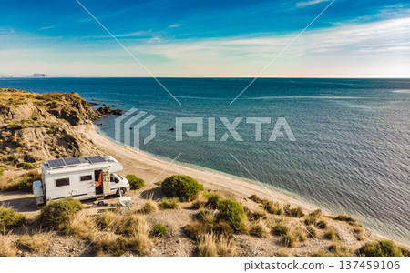 Caravan with solar panels on roof camp on sea, Spain. Aerial view. Caravan with solar panels on roof camp on sea, Spain. Aerial view. 137459106