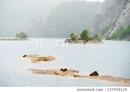 Lake in mountains, Norway stone landscape Lake in mountains, Norway stone landscape 137459129