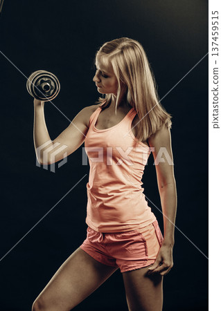 Fitness sporty girl lifting weights Fitness sporty girl lifting weights 137459515
