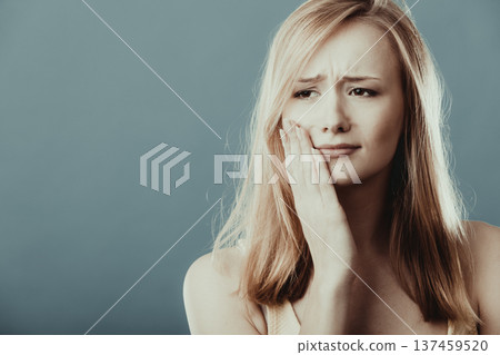 Toothache. Woman suffering from tooth pain 137459520