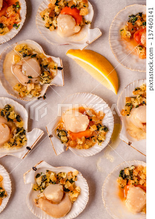 Cooked scallops with sauce Cooked scallops with sauce 137460141