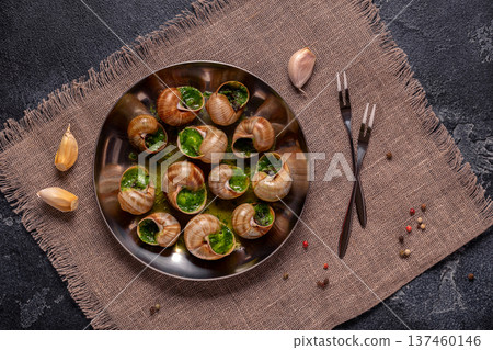 Bourgogne Escargot Snails with herb garlic oil. Bourgogne Escargot Snails with herb garlic oil. 137460146