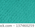 Turquoise jacquard upholstery fabric texture with soft pom pom woven pattern, cloth background 137460259