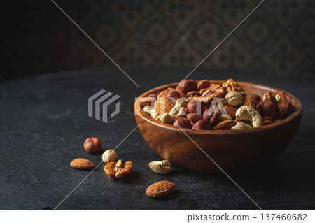 Mixed nuts in a bowl 137460682