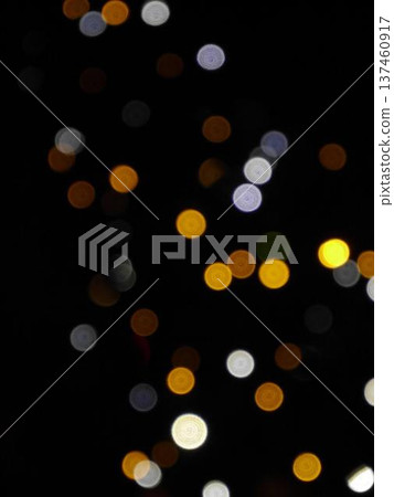 Round bokeh on a black background Round bokeh on a black background 137460917