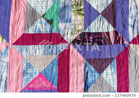 background from hand-crafted silk patchwork fabric 137460979