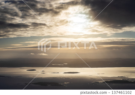 view of dark clouds over Kandalaksha bay in haze 137461102