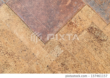 top view of joint between ceramic and cork tiles 137461157