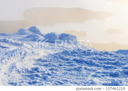 snow covered cliff and Kandalaksha bay in haze snow covered cliff and Kandalaksha bay in haze 137461229