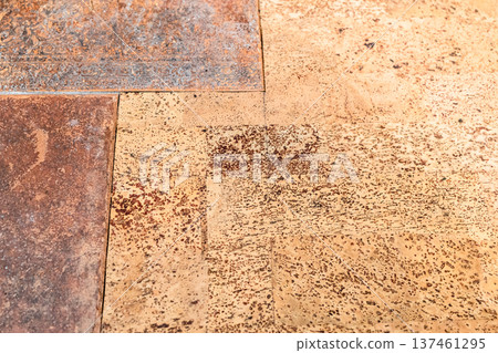 joint between ceramic tiles and cork flooring 137461295