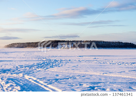 snowy surface of Kandalaksha bay at winter morning snowy surface of Kandalaksha bay at winter morning 137461341