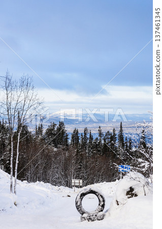 snowy road on hill in Kandalaksha in winter snowy road on hill in Kandalaksha in winter 137461345