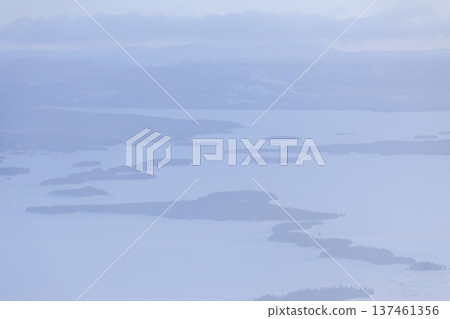 above view Kandalaksha bay in haze in winter dusk above view Kandalaksha bay in haze in winter dusk 137461356