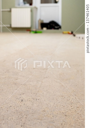 freshly laid cork flooring in room freshly laid cork flooring in room 137461405