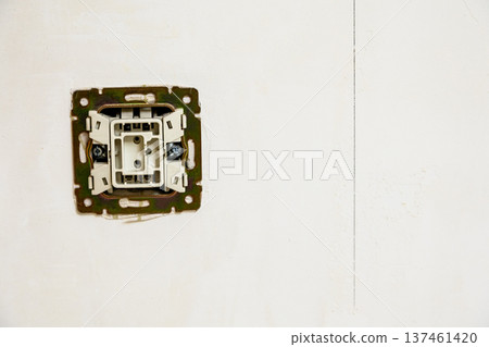 disassembled electrical switch on wall of room disassembled electrical switch on wall of room 137461420