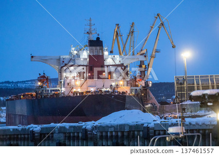 ship and cranes at Murmansk seaport in winter dusk ship and cranes at Murmansk seaport in winter dusk 137461557
