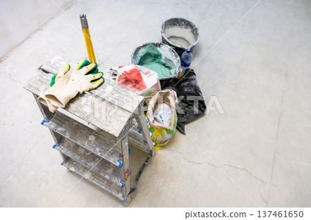 above view of plasterer's tools in concrete room above view of plasterer's tools in concrete room 137461650