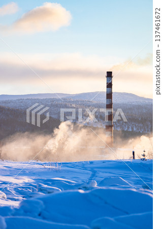 snowdrifts and chimney in Kandalaksha in winter snowdrifts and chimney in Kandalaksha in winter 137461672