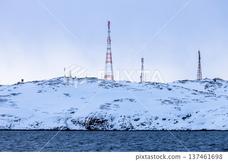 communication towers on snowy coast of Barents Sea communication towers on snowy coast of Barents Sea 137461698