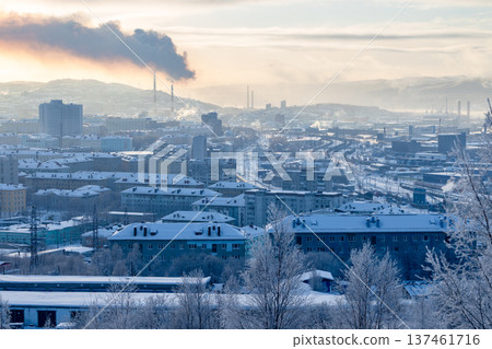 snowy Murmansk cityscape on cloudy winter evening 137461716