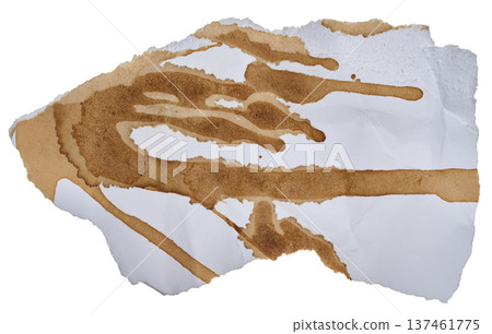 Torn piece of white paper spilled with black coffee Torn piece of white paper spilled with black coffee 137461775