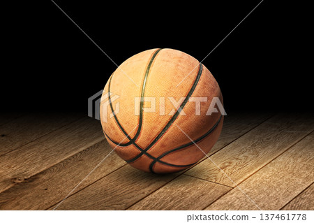 Basketball on hardwood floor 137461778
